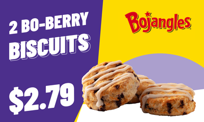A drive-thru board rendered by TheSalesMate for a national QSR brand: a two-biscuit special at $2.79, the price large on a purple panel, the biscuits photographed on a yellow ground with the brand's logo top-right